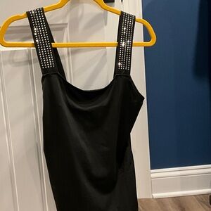 Chic Black Garment with Stylish Details